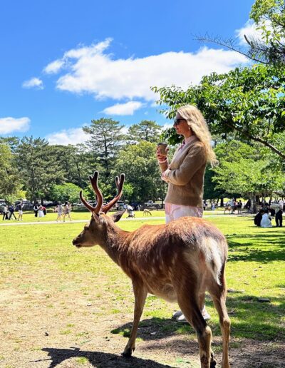 Kyoto Nara park woman with deer